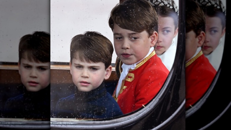 The Wales children in a carriage