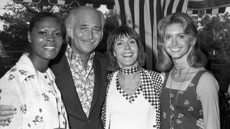 Dionne Warwick, Norman Lear, and Olivia Newton John smiling