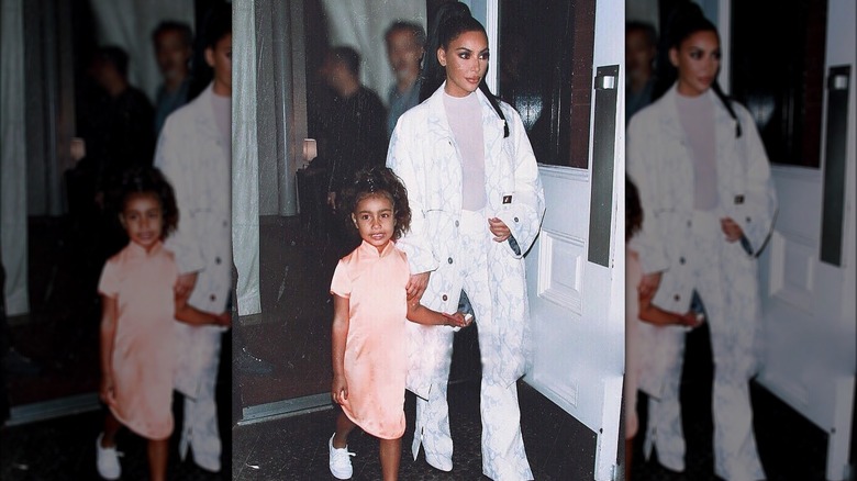 North West and Kim Kardashian walking