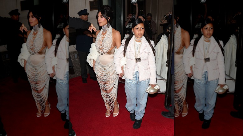 Kim Kardashian and North West walking