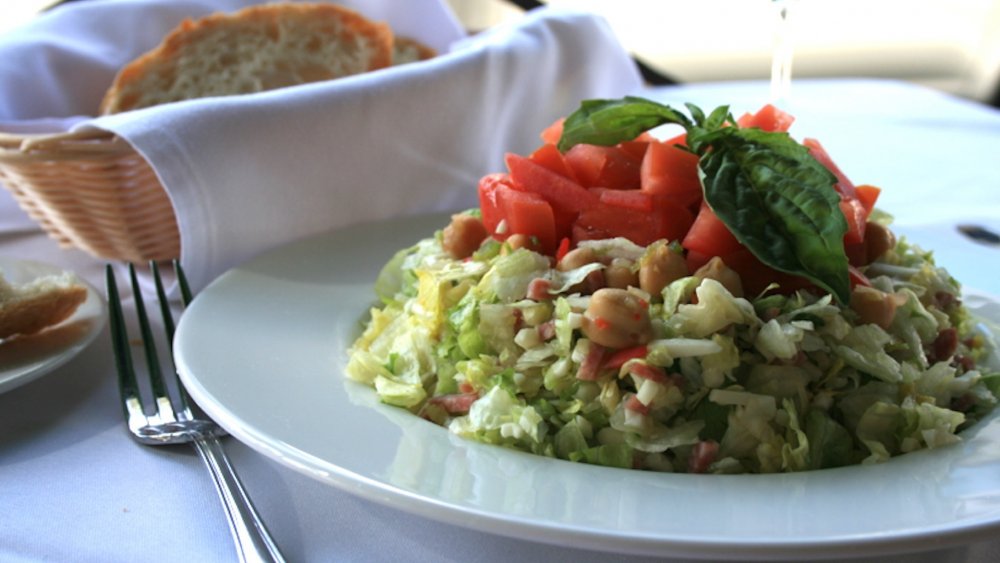 chopped salad from La Scala with salami and olives and cheese and tomatoes  