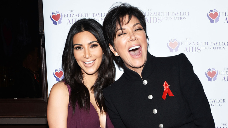 Kim Kardashian and Kris Kardashian smiling