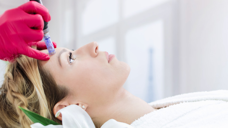 woman receiving skincare facial