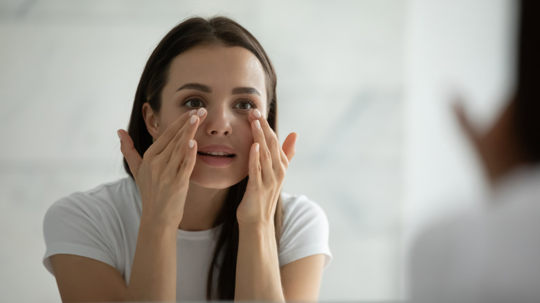 Woman washing face