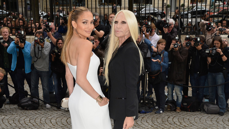 Jennifer Lopez and Donatella Versace posing together