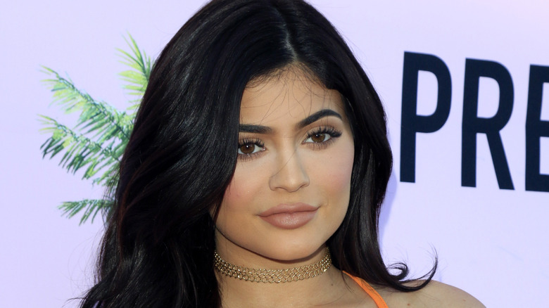 Kylie Jenner poses at an event