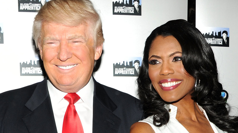 Donald Trump and Omarosa smiling together