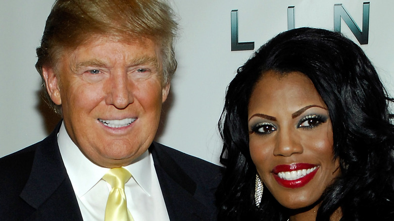 Donald Trump and Omarosa smiling