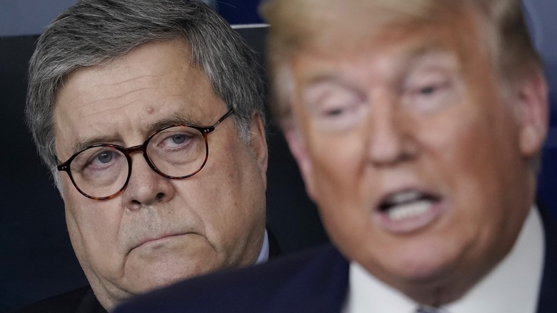 Bill Barr staring at Trump