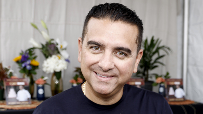 Buddy Valastro wearing blue, smiling