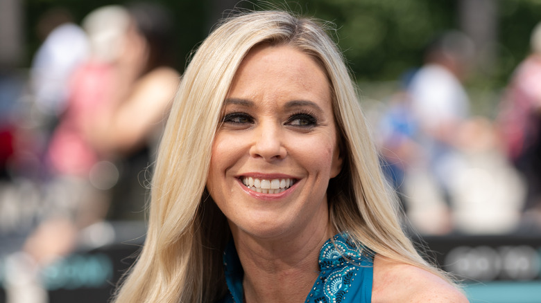 Kate Gosselin wearing blue, smiling