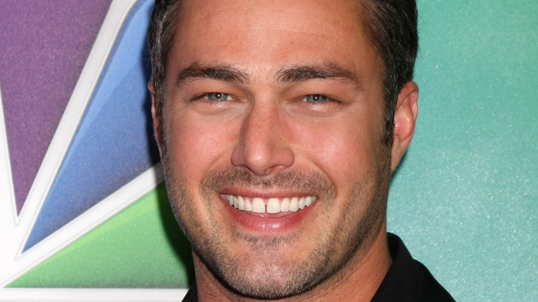 Taylor Kinney smiling