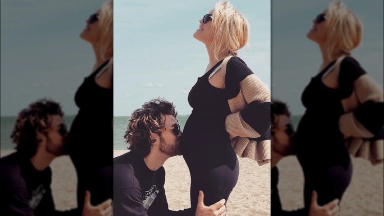 Kristen Alderson and Taylor Crousore celebrating their pregnancy