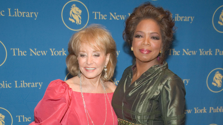 Barbara Walters and Oprah Winfrey attend a gala