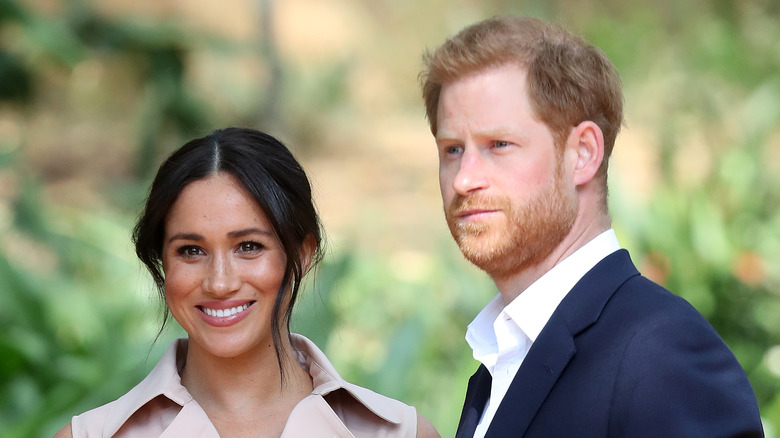 Prince Harry and Meghan Markle posing