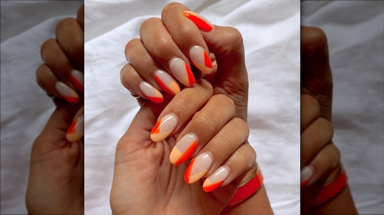 Dark and light orange nails