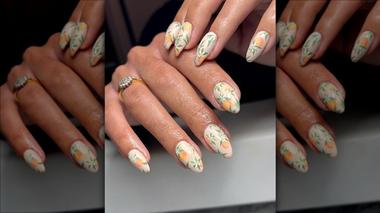 Cream nails with oranges 