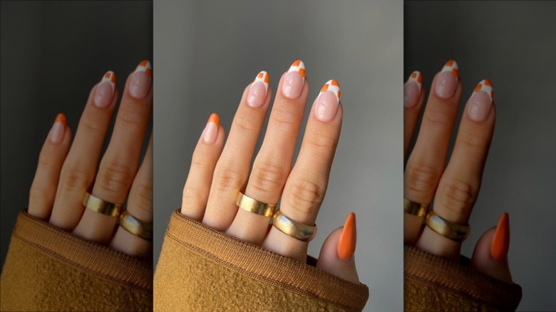 Nails with orange geometric tips