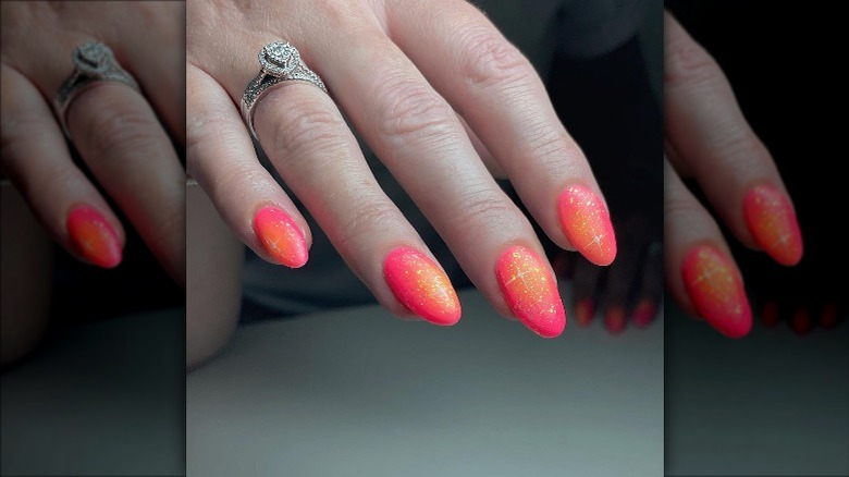 Glittery pink and orange nails