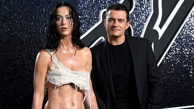 Katy Perry ripped dress Orlando Bloom black suit