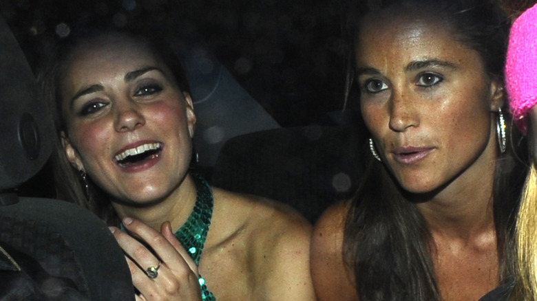 Princess Catherine and Pippa Middleton in a taxi 