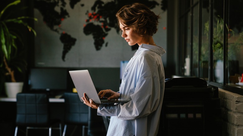 Woman looking at a laptop 