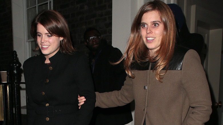 Princess Eugenie and Princess Beatrice leaving a club