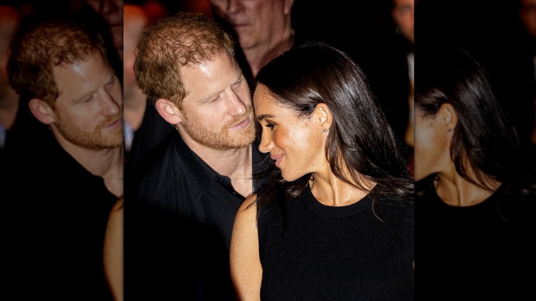 Prince Harry embracing Meghan Markle