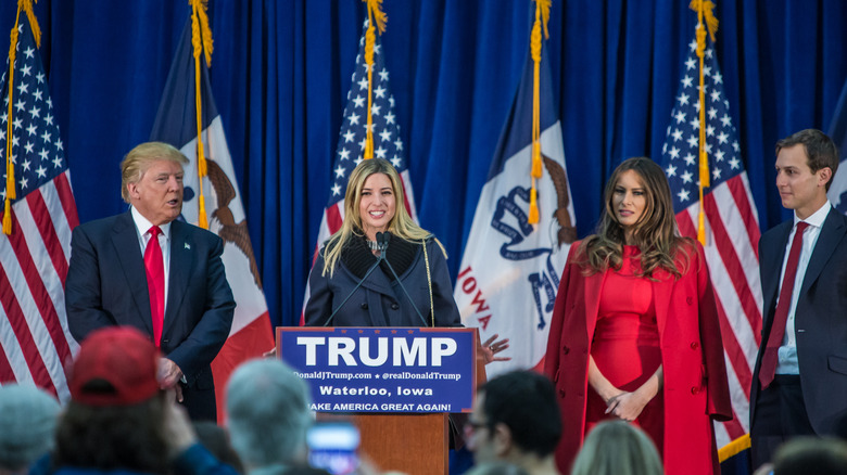 Melania, Donald, and Ivanka Trump at an event 