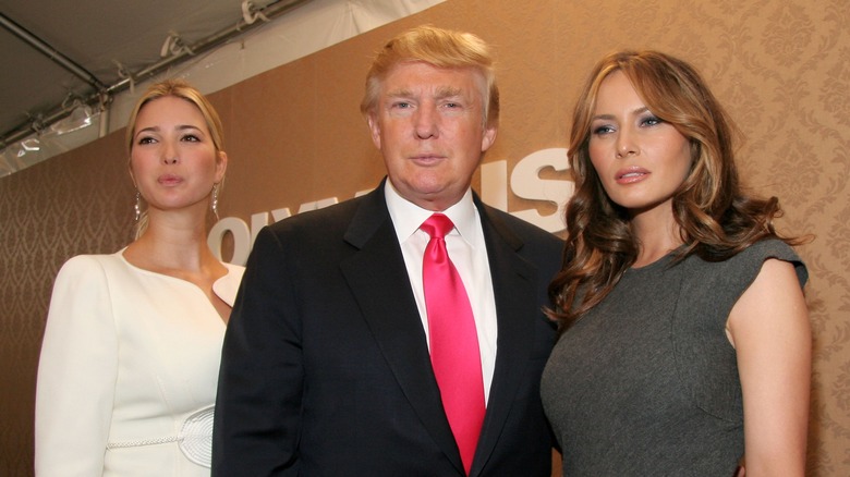 Melania, Donald, and Ivanka Trump at an event 