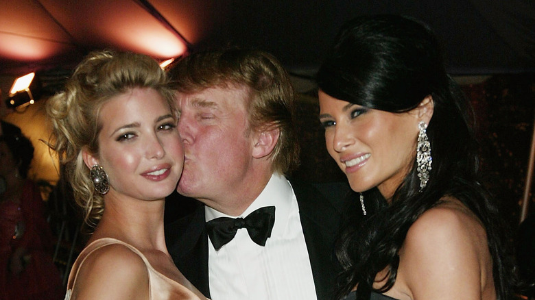 Donald, Melania, and Ivanka Trump at an event 