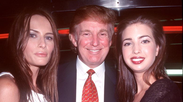 Melania, Donald, and Ivanka Trump at an event 