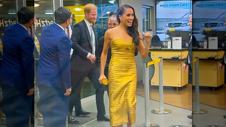 Harry, Meghan, and Doria Ragland at an event 