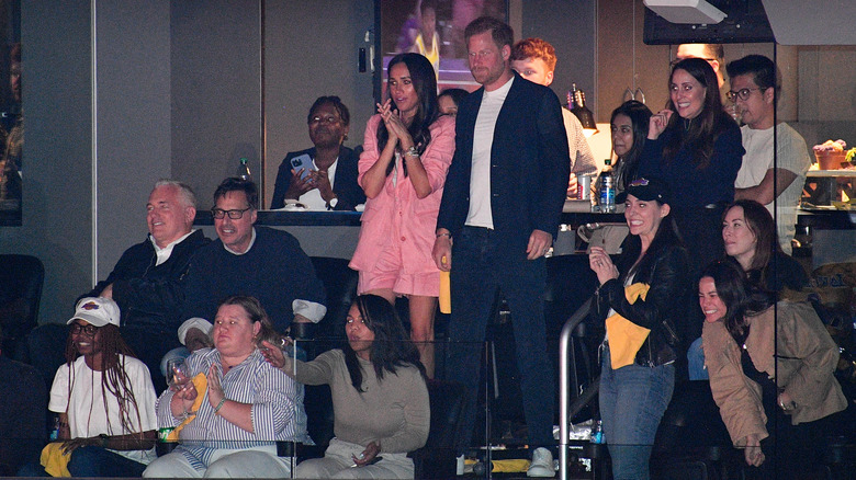 Harry and Meghan at an event 