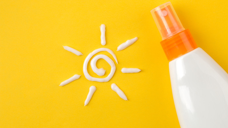 sunscreen in shape of a sun with bottle