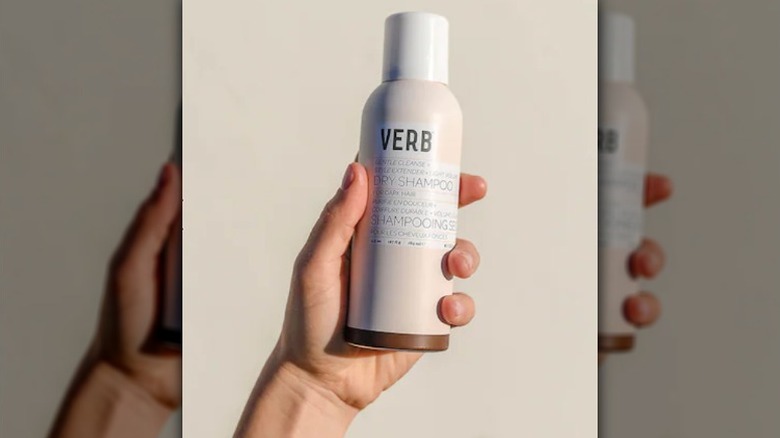 hand holding Verb dry shampoo