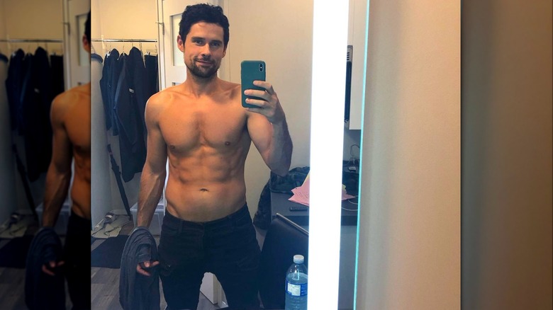 Benjamin Hollingsworth taking shirtless mirror selfie