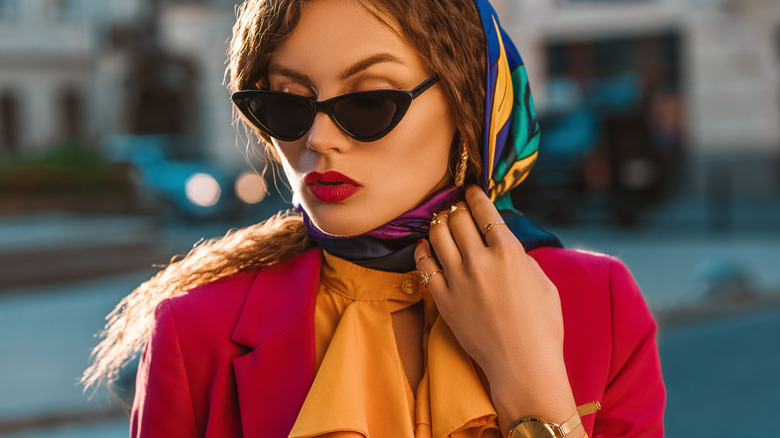 person wearing sunglasses and headscarf