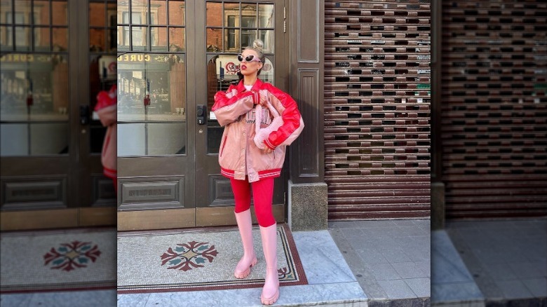 women wearing pink and red outfit