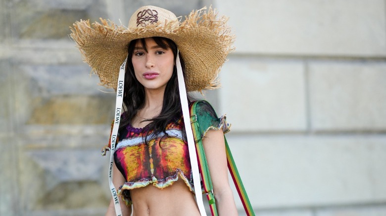 Woman wearing a big straw hat