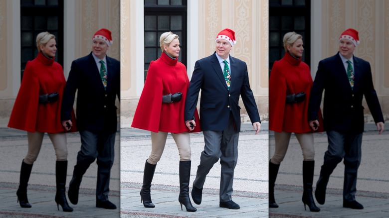 Princess Charlene holding hands with Prince Albert in 2017