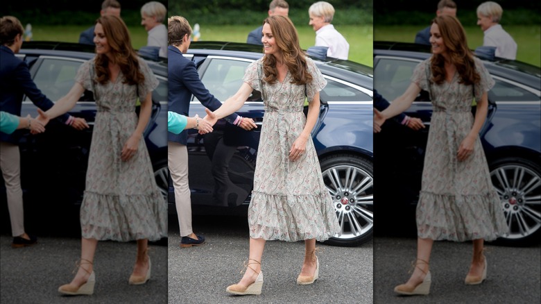 Kate Middleton shaking hands