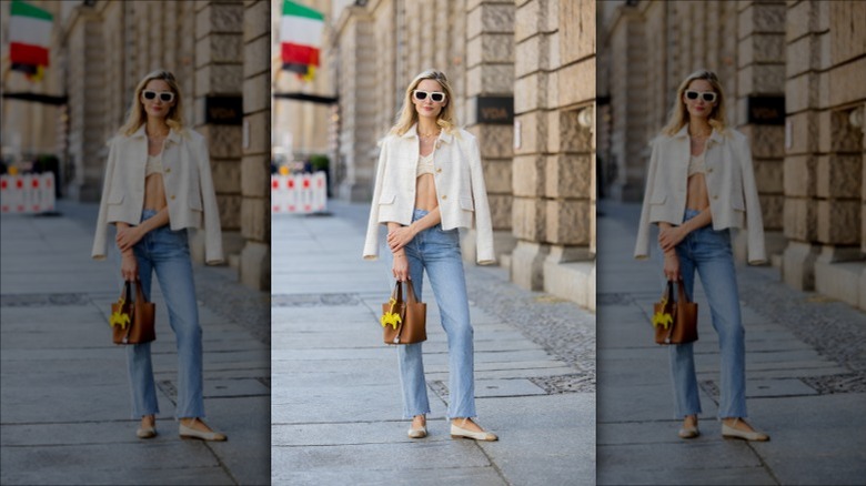 Woman in sunglasses posing