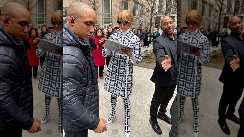 Celine Dion in floral signing autographs