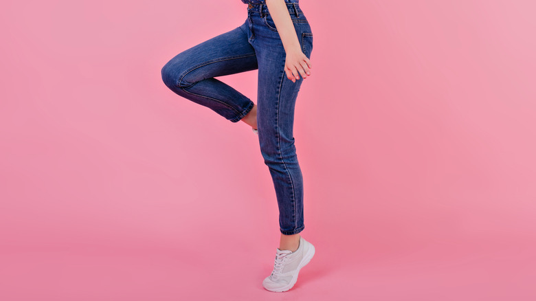 Woman wearing dark wash jeans