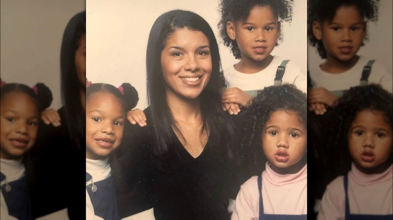 Page Turner poses with her three daughters Qai, Zaire, and Quincy