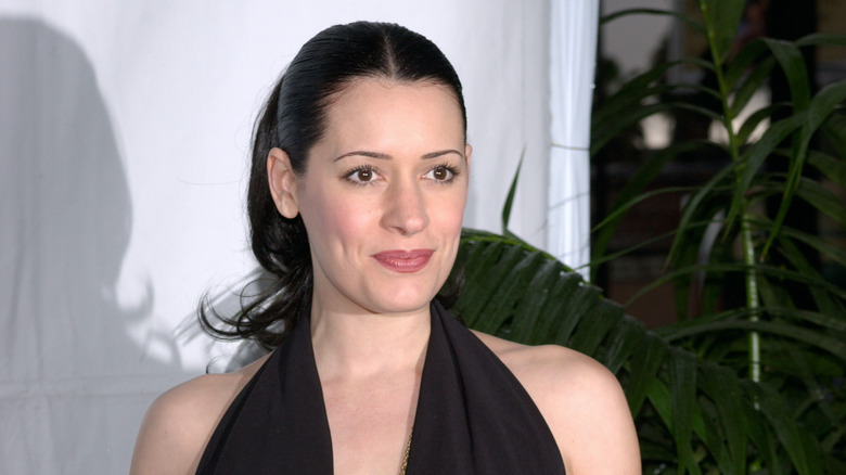 Paget Brewster posing for press at the Writer's Guild Awards