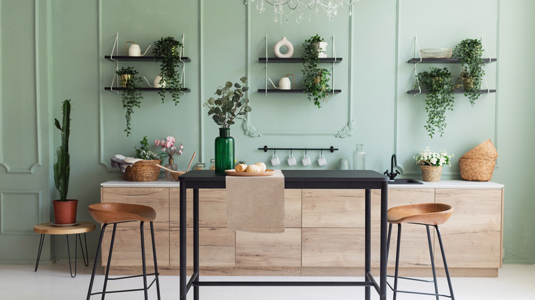 Dining area with light green paint