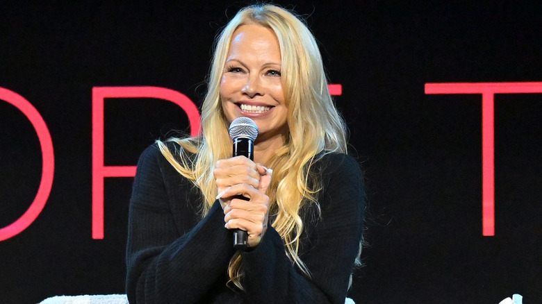 Pamela Anderson speaking on stage