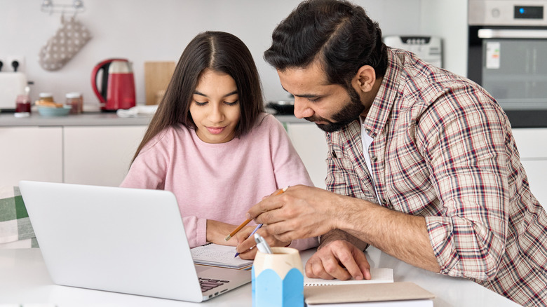 dad helping with child's homework